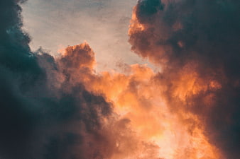 Dramatic Sunset Clouds With Golden Light And Dark Stormy Sky