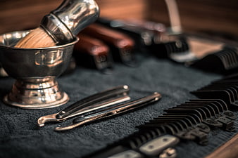 Vintage Barbershop Tools on Dark Towel
