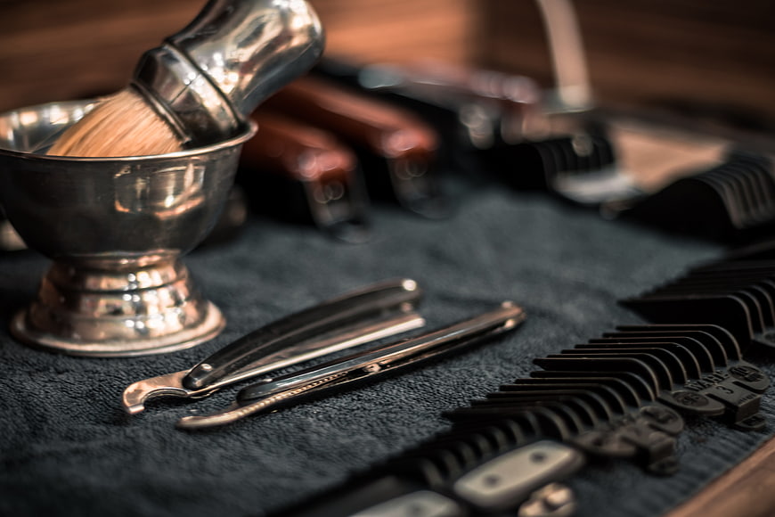 Vintage Barbershop Tools on Dark Towel