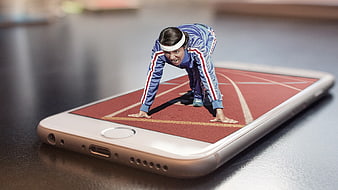 Female sprinter in starting position on smartphone screen