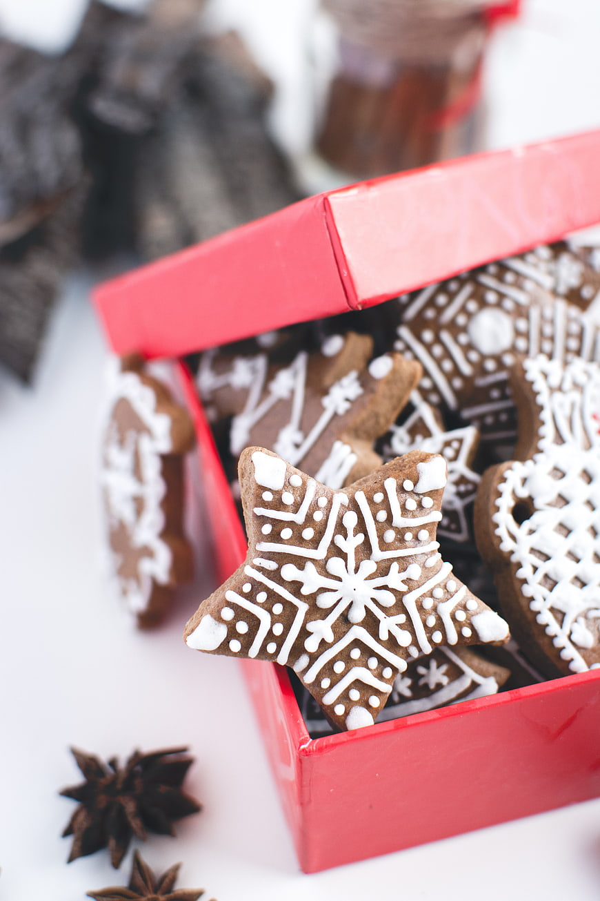 Traditional Christmas gingerbread cookies in a red gift box