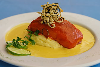 Gourmet stuffed pepper with mashed potatoes and crispy garnish