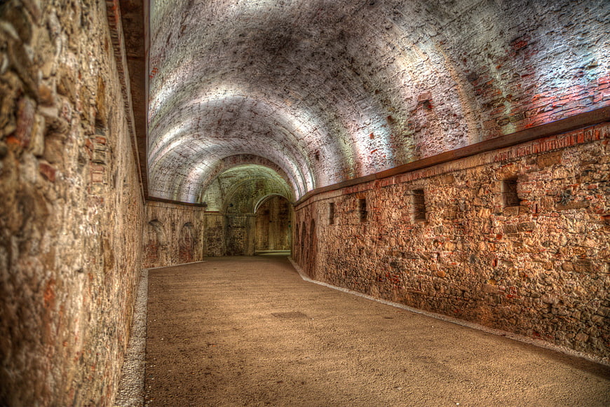 HDR Brick Tunnel with Arched Ceiling and Textured Walls