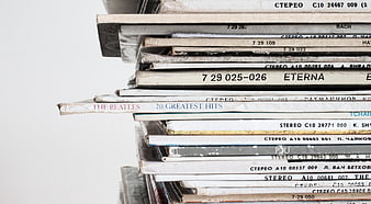 Stack of vintage vinyl records with white background