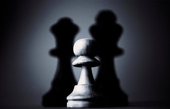 White Chess Pawn with Blurred Queen Shadows