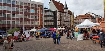 Outdoor Charity Fair in European Town Square