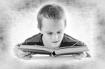 Young Boy Reading Book in Black and White