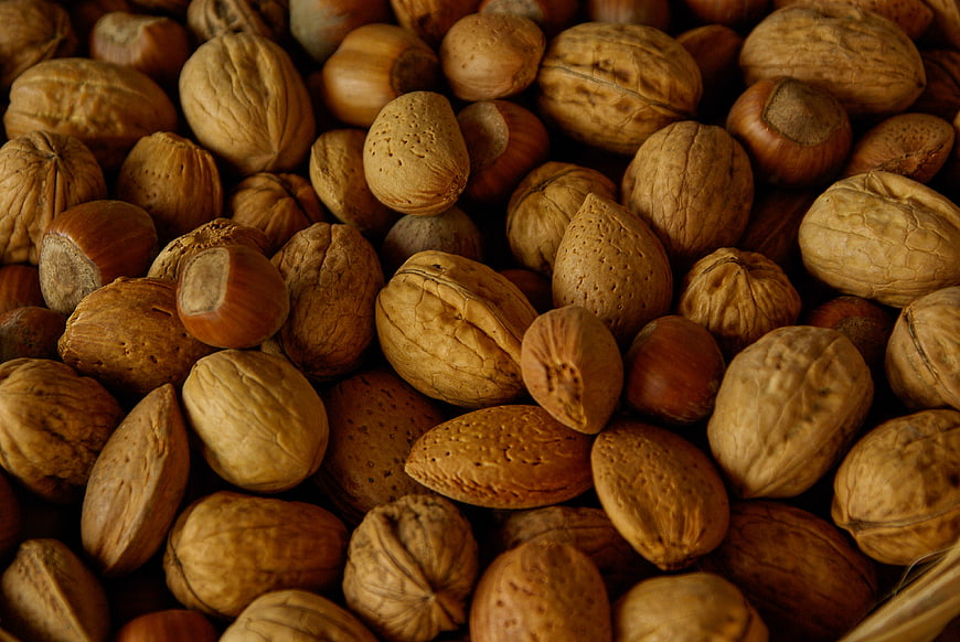 Close-up of mixed nuts including walnuts, almonds, and hazelnuts