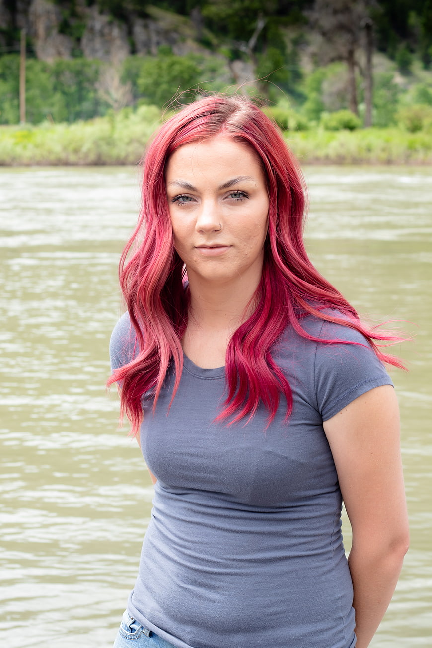 Portrait of Woman with Pink Hair by River
