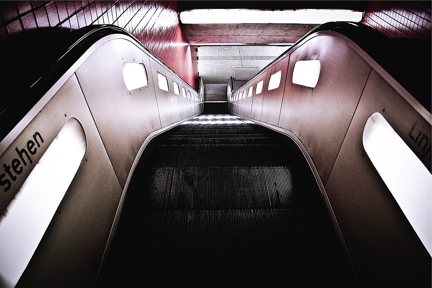 Low angle view of empty escalator in subway station