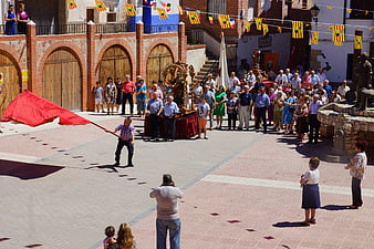 Traditional Spanish religious procession in a village square
