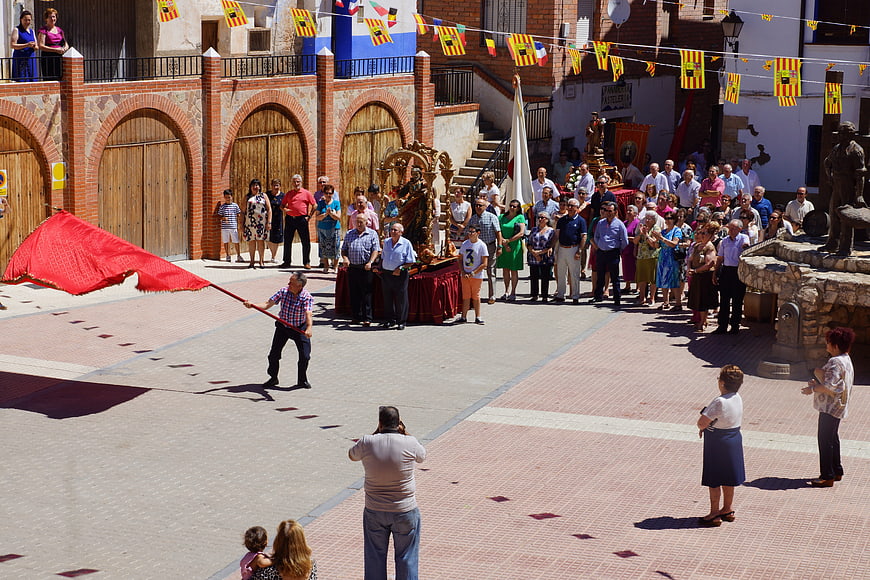 Traditional Spanish religious procession in a village square