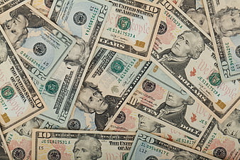 Scattered US Dollar Bills Background Texture