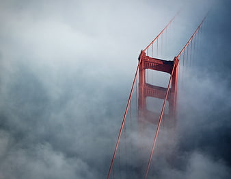 Golden Gate Bridge Tower Emerging from Thick Fog