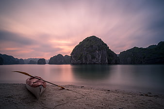 Kayak on Beach at Lan Ha Bay Sunset with Karst Islands
