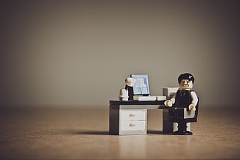 Sad Lego Businessman at Office Desk