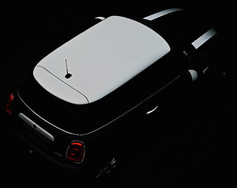 High Angle View of Black Mini Cooper with White Roof