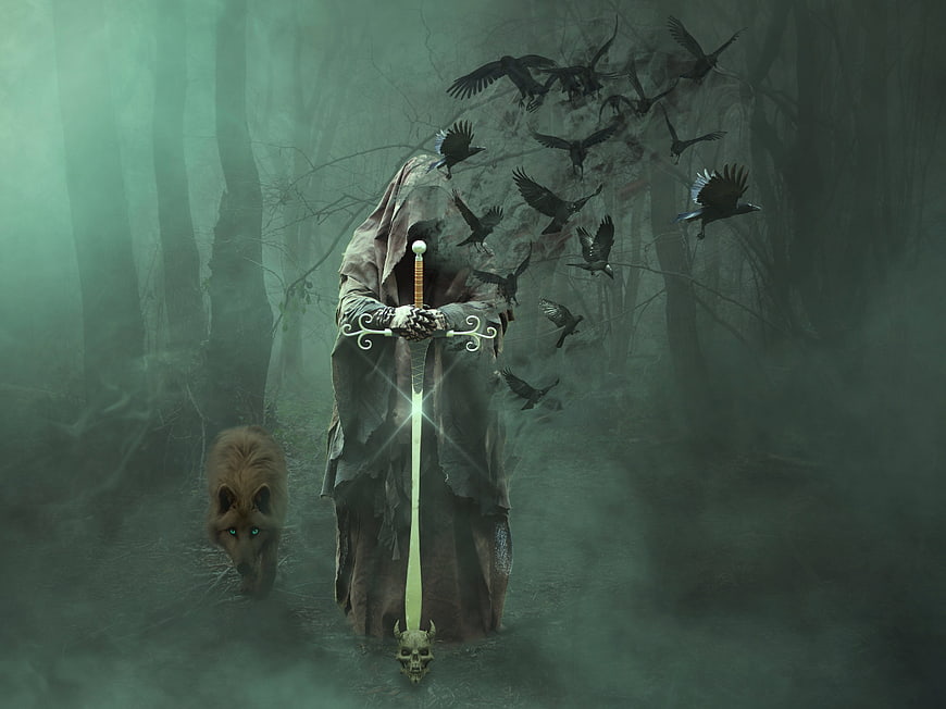 Mysterious hooded figure with glowing sword in foggy forest