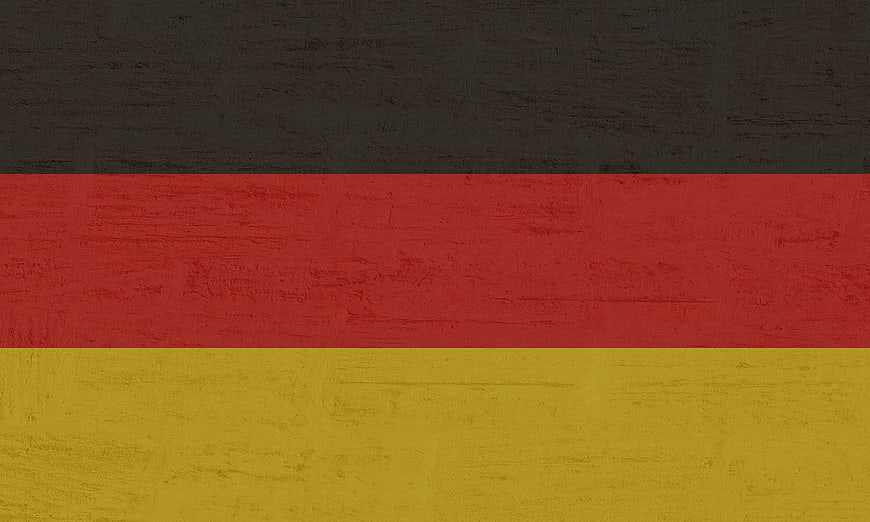 Textured German Flag Background with Black, Red, and Gold Stripes