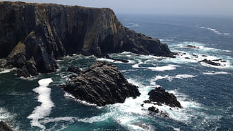 Dramatic Coastal Cliffs and Ocean Waves