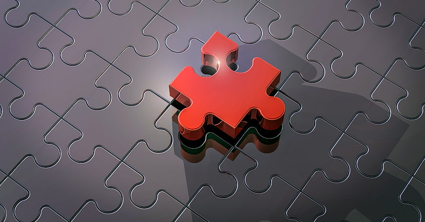 Red 3D Puzzle Piece Missing from Gray Background