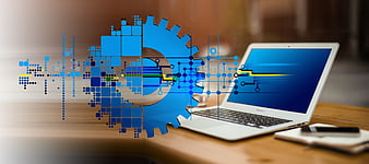 Laptop with Digital Gear and Circuit Overlay for Technology Concept