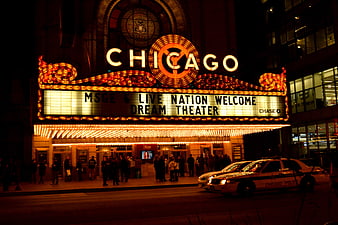 Chicago Theatre Marquee at Night with Police Car