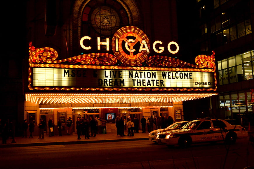 Chicago Theatre Marquee at Night with Police Car