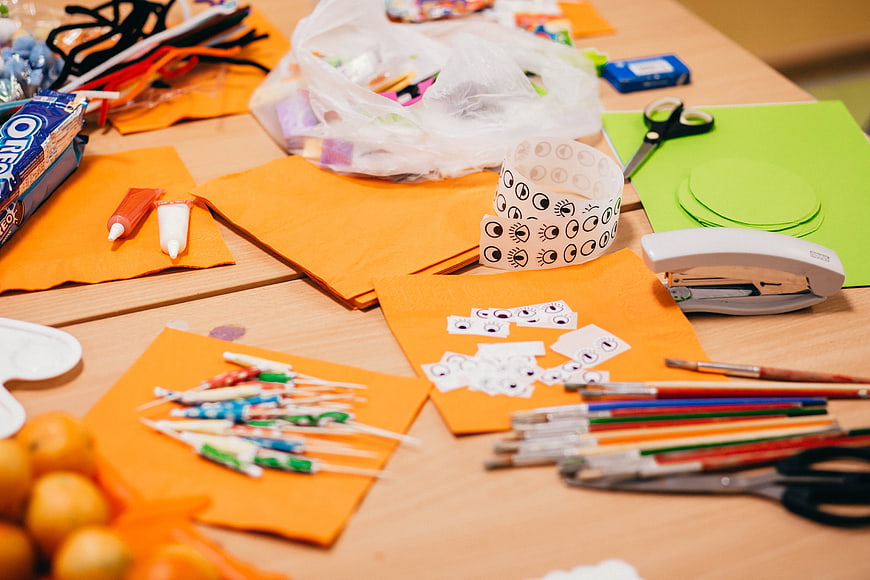 Colorful Halloween Craft Supplies on Wooden Table