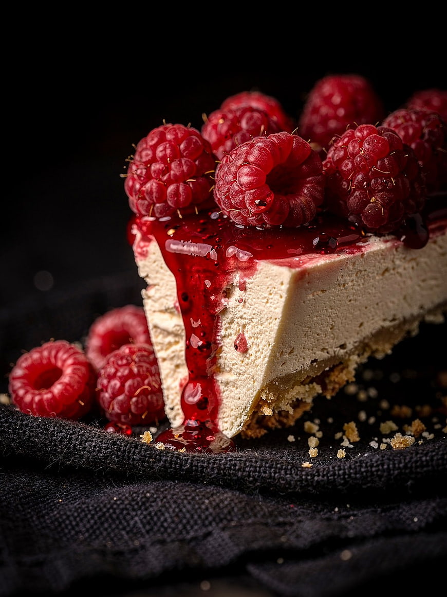 Gourmet Raspberry Cheesecake Slice with Dripping Sauce
