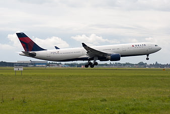 Delta Air Lines Boeing 767 Landing at Airport Runway