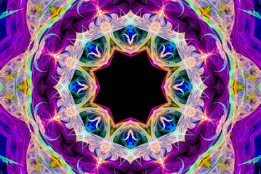Vibrant purple kaleidoscope pattern with black center