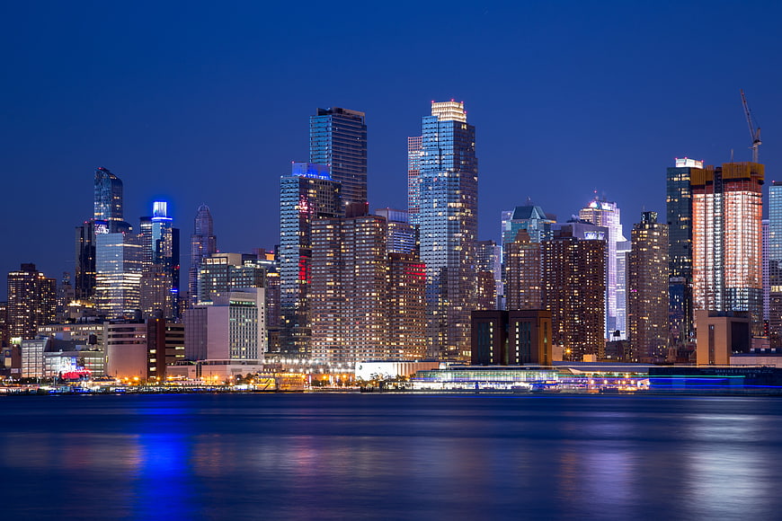 New York City Skyline at Dusk with Water Reflections