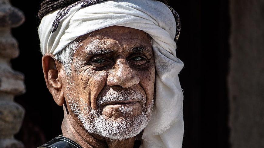 Close-up Portrait of Elderly Arab Man with White Turban