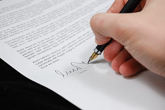 Hand Signing Document with Fountain Pen Close Up