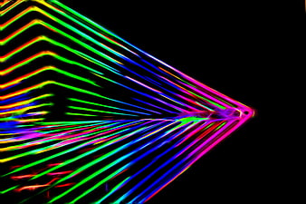 Vibrant Neon Light Trails Abstract Pattern On Black Background