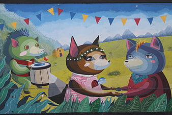 Colorful street art mural of anthropomorphic animals dancing