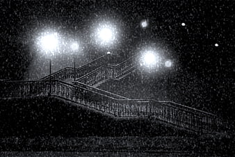 Snowy Staircase With Ornate Railings And Glowing Street Lamps At Night