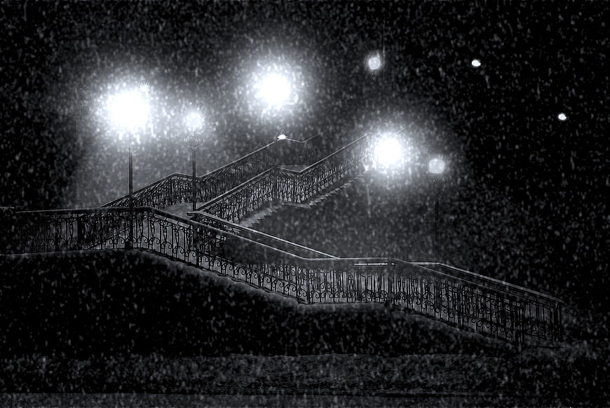 Snowy Staircase With Ornate Railings And Glowing Street Lamps At Night