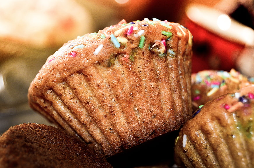 Close-up of homemade muffins with colorful sprinkles