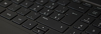 Close-up of black laptop keyboard keys