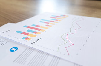 Close-up of financial business charts and graphs on paper