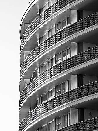 Black and white curved modern apartment building facade