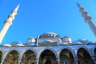 Süleymaniye Mosque Minarets and Arches Against Blue Sky