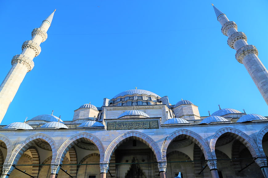 Süleymaniye Mosque Minarets and Arches Against Blue Sky