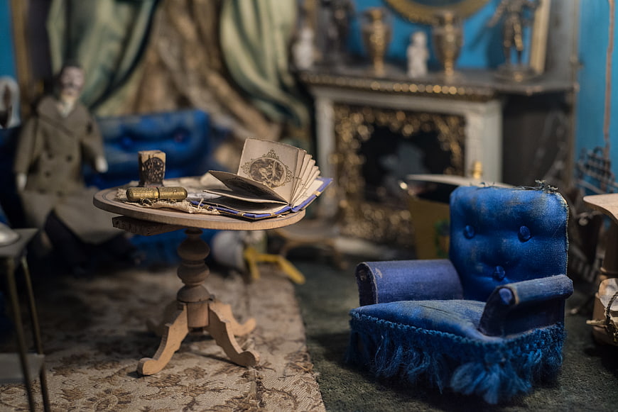 Miniature Victorian Living Room with Blue Chair and Open Book