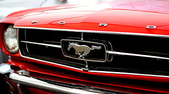 Close-up of Classic Red Ford Mustang Front Grille