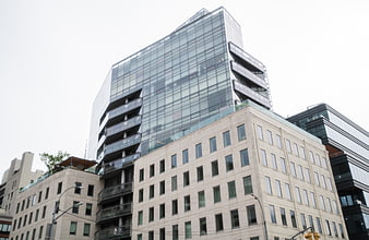 Modern Glass Office Building with Stone Base