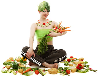Creative woman portrait with vegetable hair and fresh produce on white background