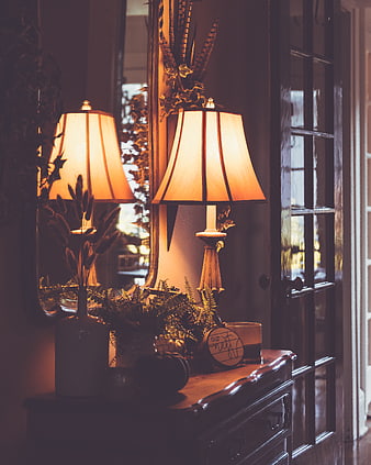 Warm Glowing Table Lamp in Cozy Interior with Mirror